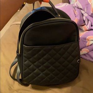small black purse/backpack